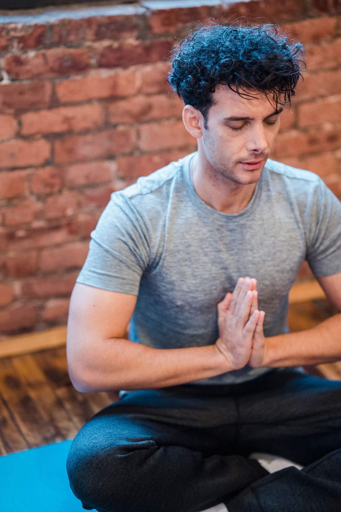 Man practicing mindful breathing in a seated position