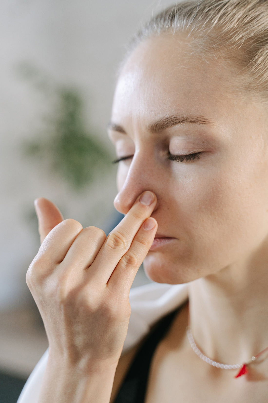 Woman practicing a focused breathing exercise